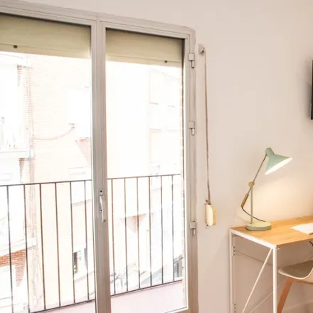 Rent this 4 bed room on Madrid in Calle Baleares, 29