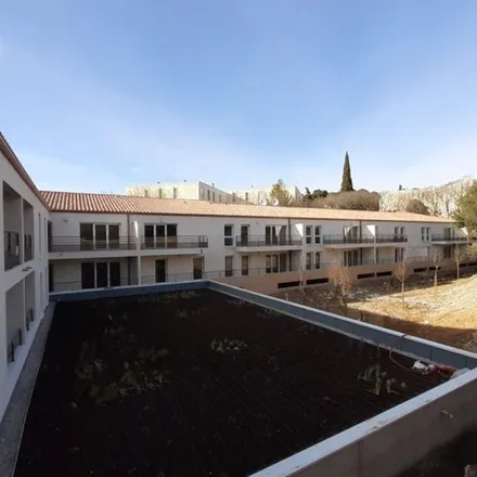 Rent this 2 bed apartment on 1 Place de l'Hôtel de Ville in 30000 Nîmes, France