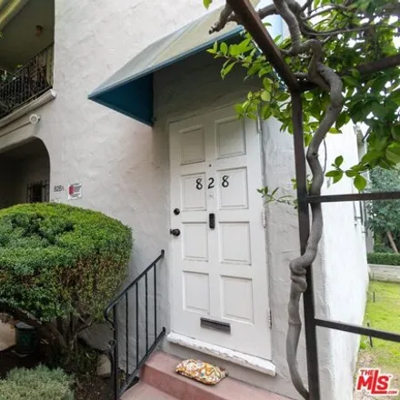Buy this 8 bed house on 844 North Sweetzer Avenue in Los Angeles, CA 90069