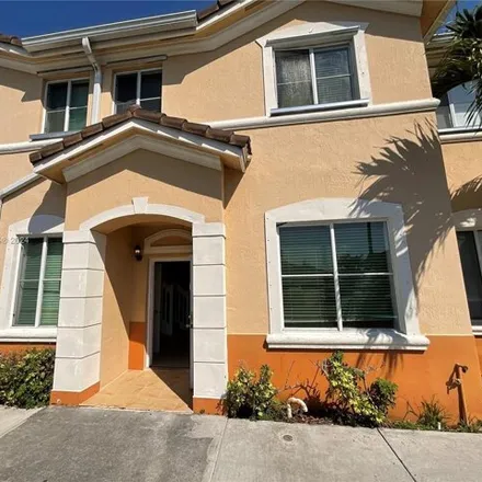 Rent this 3 bed townhouse on 7319 Northwest 174th Terrace in Miami-Dade County, FL 33015