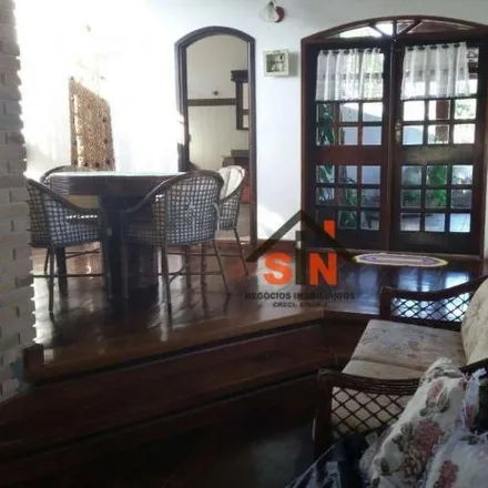 Buy this 4 bed house on Avenida Doutor Aldino Schiavi in Jardim Bela Vista, Caraguatatuba - SP
