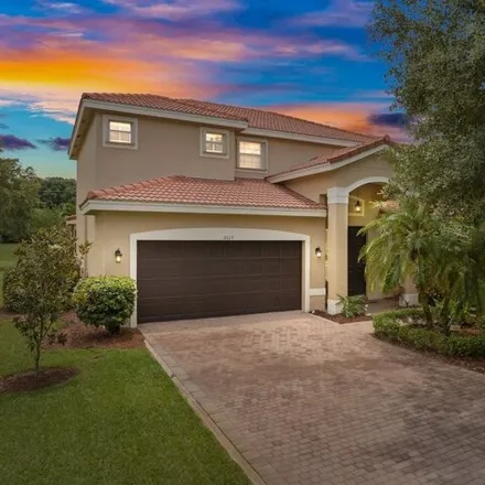 Buy this 4 bed house on 1949 Grey Falcon Circle Southwest in Florida Ridge, FL 32962