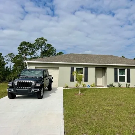 Rent this 3 bed house on 2882 Gaghagen Road Southeast in Palm Bay, FL 32909