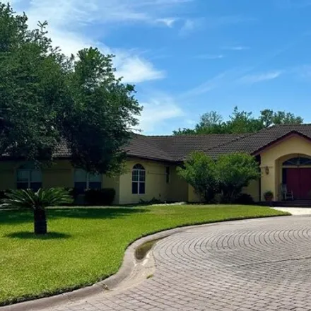 Buy this 4 bed house on 3326 East Cobblestone Creek Drive in Harlingen, TX 78550
