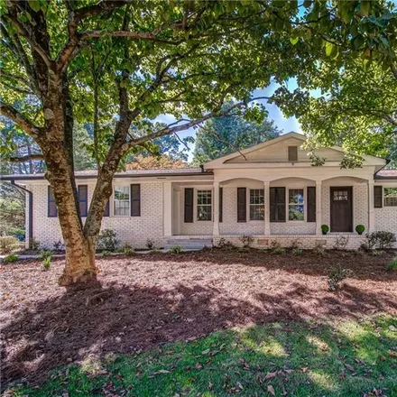 Buy this 3 bed house on 1762 Chateau Drive in Dunwoody, GA 30338