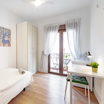 Rent this 6 bed room on Avenida de la Albufera in 28018 Madrid, Spain