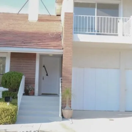 Rent this 4 bed house on 10316 Mossy Rock Circle in Los Angeles, CA 90077