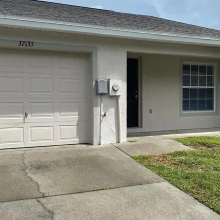 Rent this 3 bed house on 37206 Grassy Hill Lane in Dade City, FL 33525