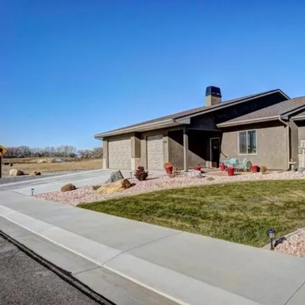 Buy this 4 bed house on 2622 Tiger Eye Lane in Grand Junction, CO 81506