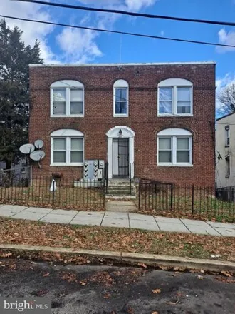 Buy this 9 bed house on 2824 Buena Vista Terrace Southeast in Washington, DC 20020