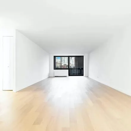 Rent this 3 bed apartment on 243 East 58th Street in New York, NY 10022
