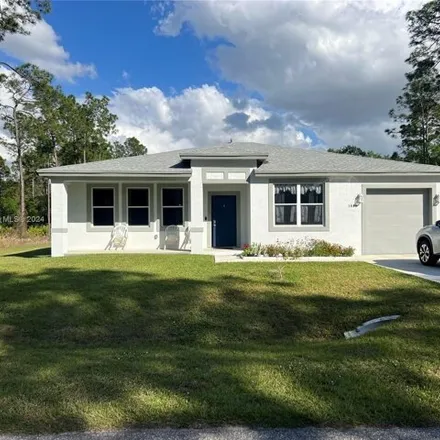 Buy this 3 bed house on 1637 Greenwood Avenue in Lehigh Acres, FL 33972