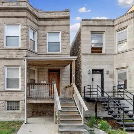 Buy this 6 bed house on 3246 West Diversey Avenue in Chicago, IL 60618