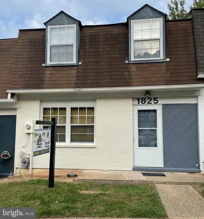 Buy this 4 bed townhouse on 1825 Village Green Drive in Hyattsville, MD 20785