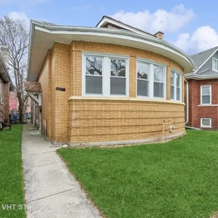 Buy this 3 bed house on 8015 South Paxton Avenue in Chicago, IL 60617