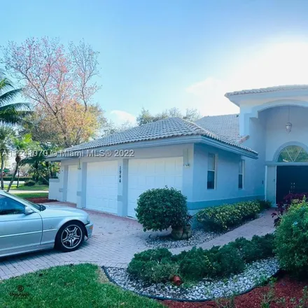 Rent this 4 bed house on 1944 Classic Drive in Coral Springs, FL 33071