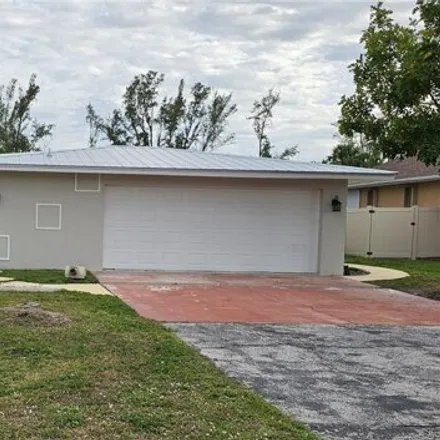 Buy this 3 bed house on 2084 Coral Point Drive in Cape Coral, FL 33990