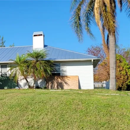 Rent this 3 bed house on 1828 Northeast 13th Place in Cape Coral, FL 33909