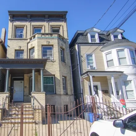 Buy this 6 bed townhouse on 97 3rd Avenue in Newark, NJ 07104