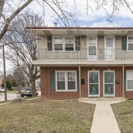 Buy this studio townhouse on 7330 in 7332 West Silver Spring Drive, Milwaukee
