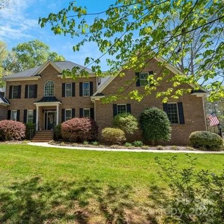 Buy this 4 bed house on 6909 Lake Brook Trail in Waxhaw, NC 28173