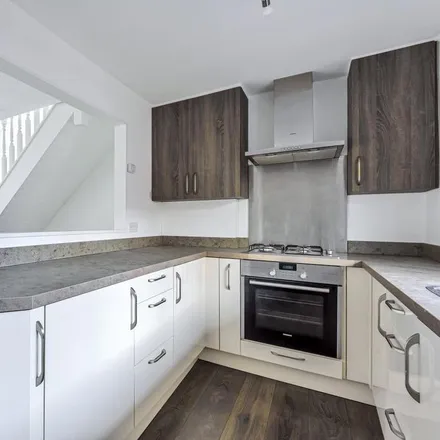 Rent this 2 bed townhouse on The Rising Sun in Bridge Street, Winchester