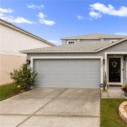 Buy this 4 bed house on 2122 Whispering Trails Boulevard in Winter Haven, FL 33884