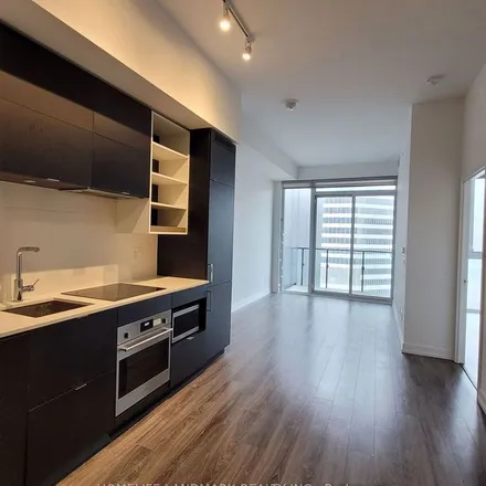 Rent this 3 bed apartment on Panda Condos in Lane W Yonge S Elm, Old Toronto