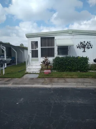 Buy this 2 bed house on Caribbean Way in Pinellas County, FL 33778