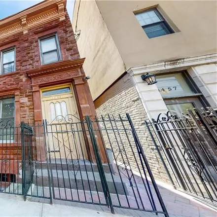 Buy this 4 bed townhouse on 9-02 43rd Road in New York, NY 11101