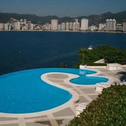 Rent this 4 bed apartment on Cerrada Caracol in Playa Guitarrón, 39300 Acapulco