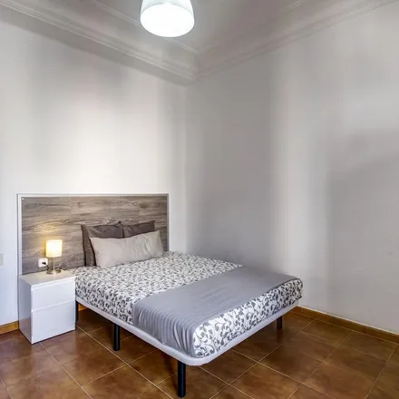 Rent this 7 bed apartment on Plaça de Margarita Valldaura in 46001 Valencia, Spain