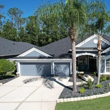 Buy this 5 bed house on 27016 Brush Creek Way in Seven Oaks, FL 33544