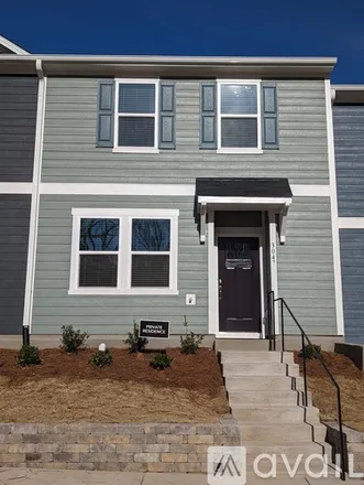 Rent this 3 bed townhouse on 3047 Spline Circle