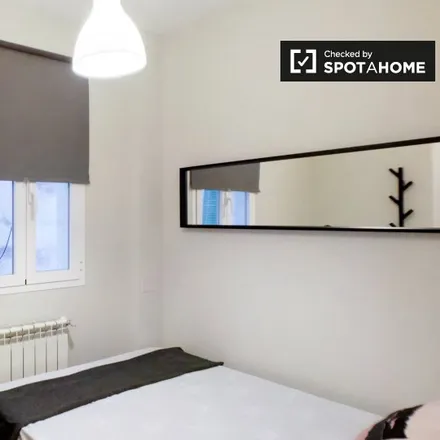 Rent this 6 bed room on Madrid in Ibercaja, Calle de Ibiza