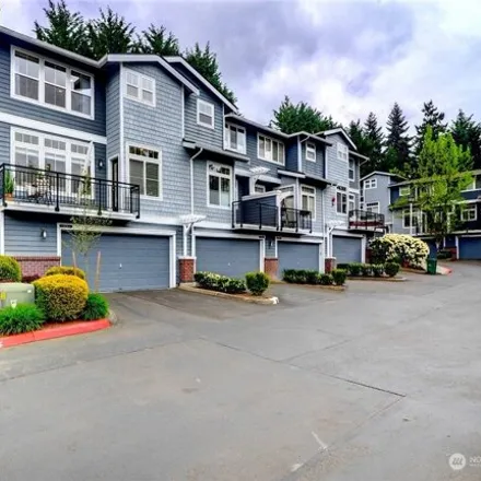 Buy this 3 bed townhouse on 8811 123rd Lane Northeast in Rose Hill, Kirkland