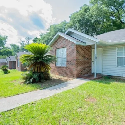 Rent this 4 bed house on 1676 Pasco Street in Tallahassee, FL 32310