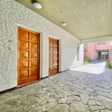 Buy this 3 bed house on Presidente Santiago Derqui 32 in Partido de Morón, B1685 AAD El Palomar