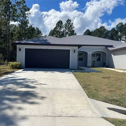 Rent this 3 bed house on 37 Freneau Lane in Palm Coast, FL 32137