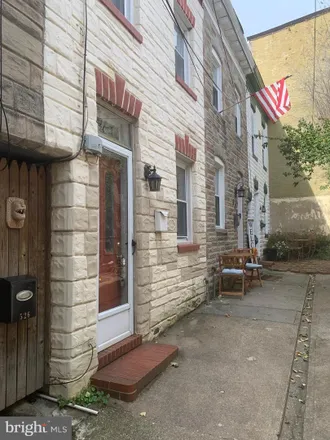 Rent this 1 bed townhouse on 520 Holtzman Court in Baltimore, MD 21231