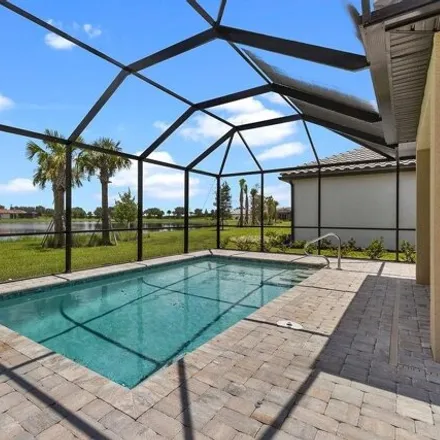 Rent this 3 bed house on Harmony Drive in Collier County, FL