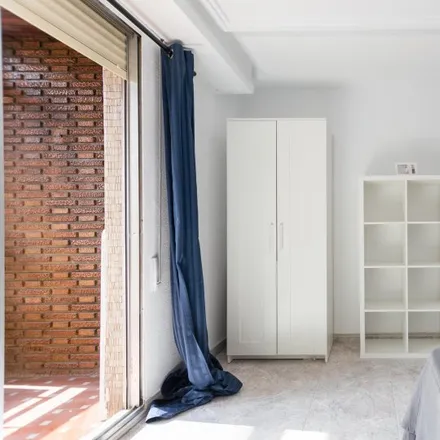Rent this 7 bed room on Carrer de Santa Rosa in 20, 46021 Valencia
