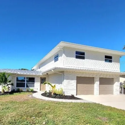 Buy this 6 bed house on 1898 Greenwood Drive in Oldsmar, FL 34677