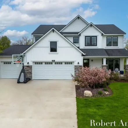 Buy this 5 bed house on 5446 Harvest Moon Court Northeast in Cannon Township, MI 49306