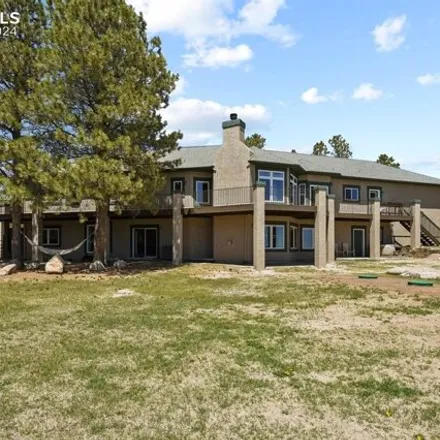 Buy this 4 bed house on Windy Pine Drive in El Paso County, CO