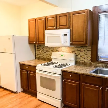 Rent this 3 bed apartment on 436 Warren Ave