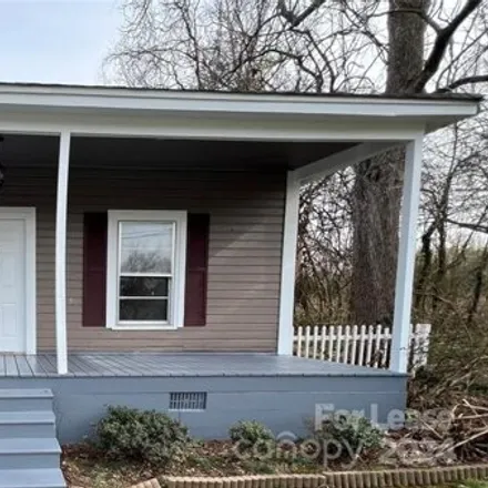 Rent this 4 bed house on 234 North Clay Street in Lowell, NC 28098