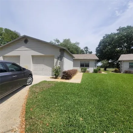 Rent this 2 bed house on 3892 River Oaks Court in Seven Springs, Pasco County