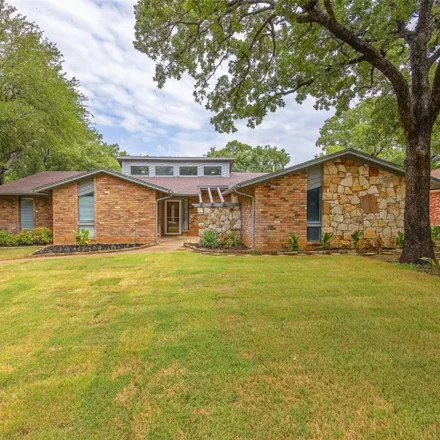 Buy this 4 bed house on 2011 Reverchon Drive in Arlington, TX 76017