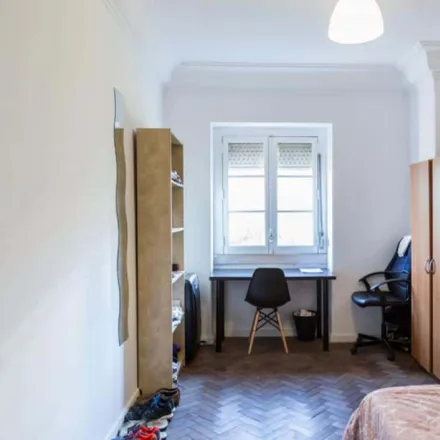 Rent this 7 bed room on Rua José Estevão 24 in 1150-192 Lisbon, Portugal